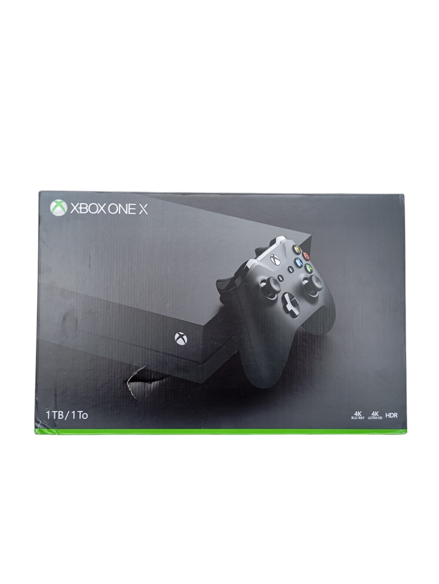 Console Xbox One X en boîte