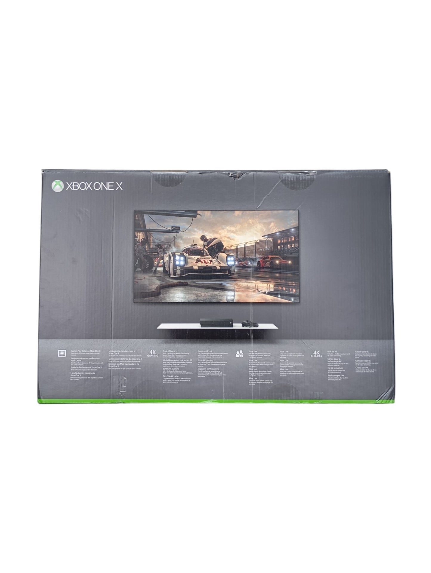 Console Xbox One X en boîte