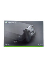 Console Xbox One X en boîte