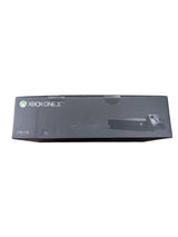 Console Xbox One X en boîte