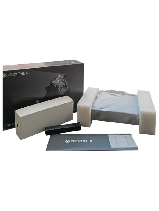 Console Xbox One X en boîte