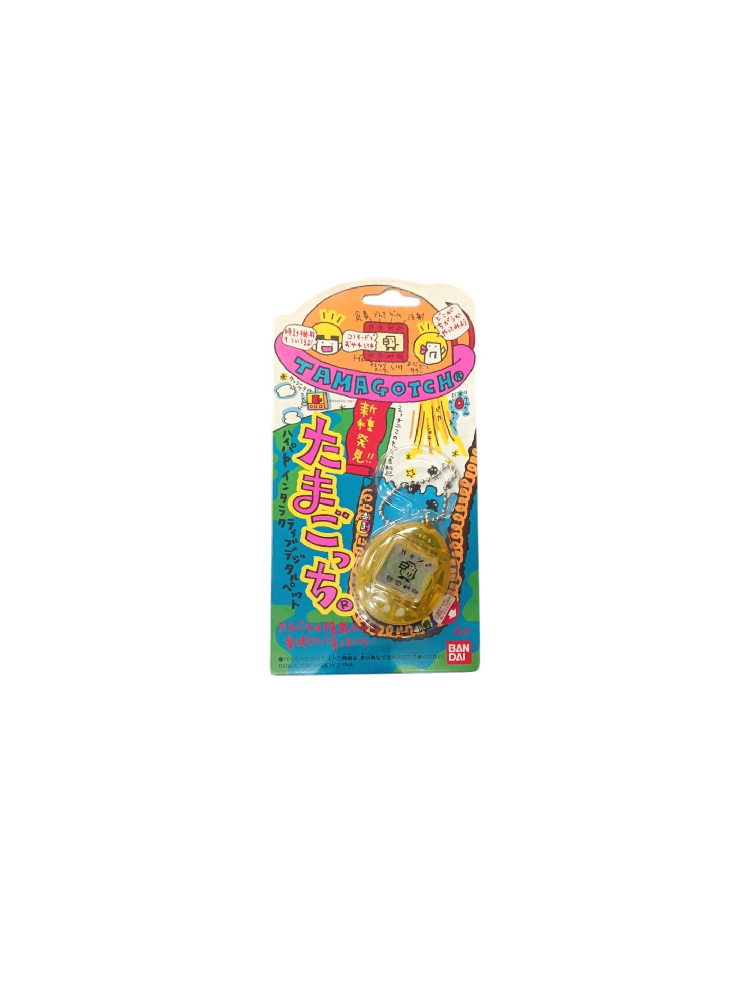 Tamagotchi Bandai version japonaise jaune en blister