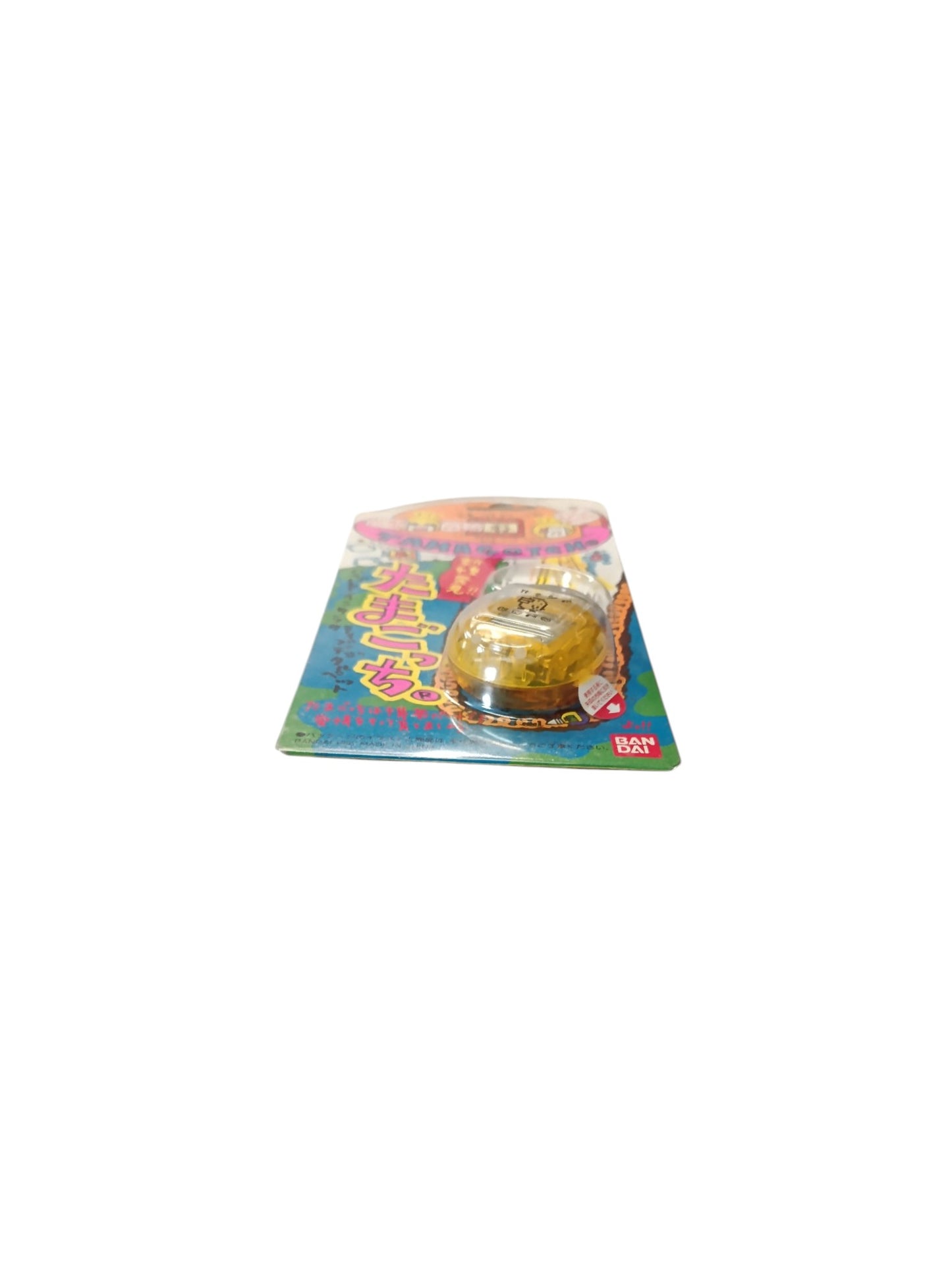 Tamagotchi Bandai version japonaise jaune en blister