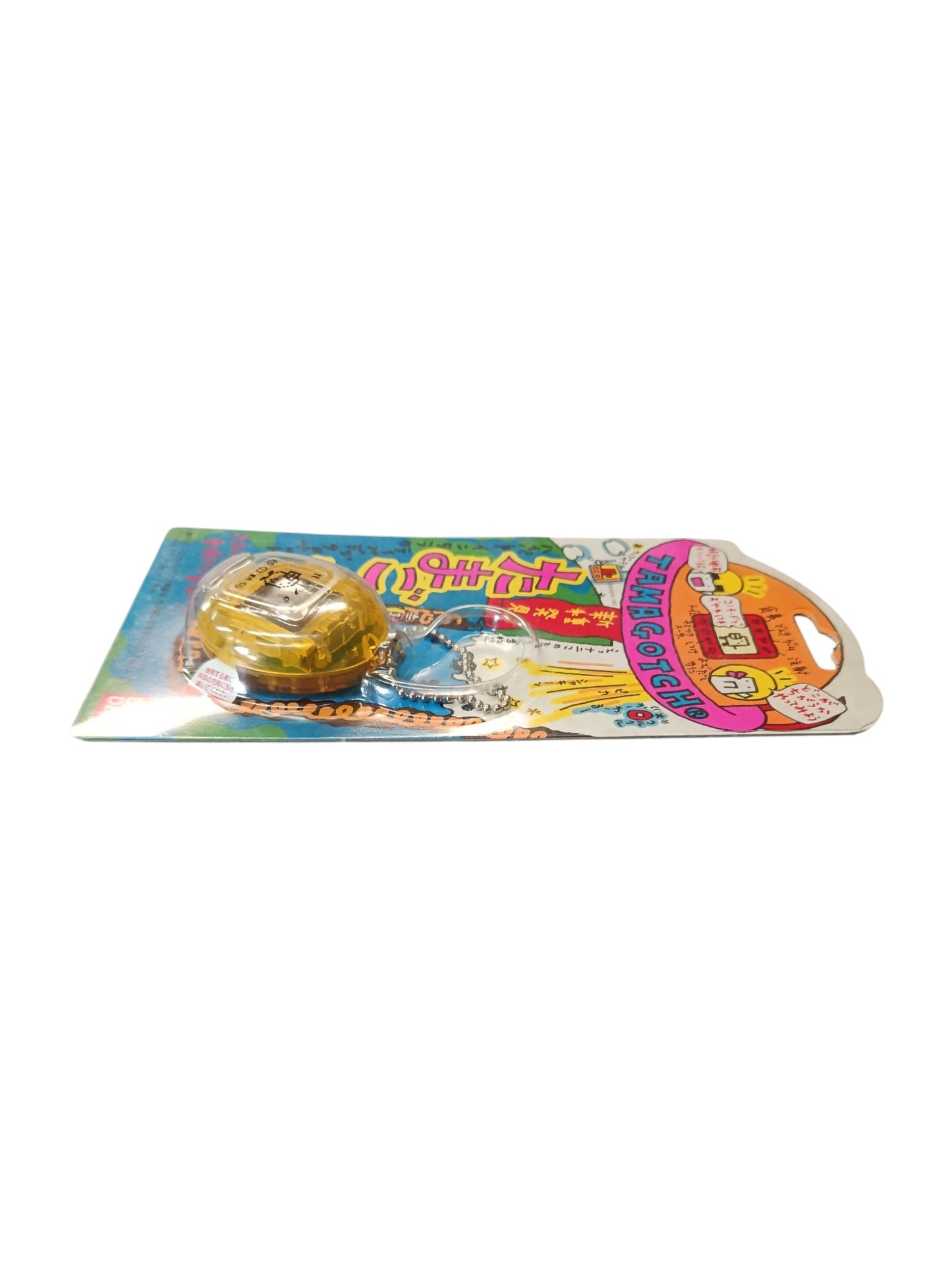 Tamagotchi Bandai version japonaise jaune en blister