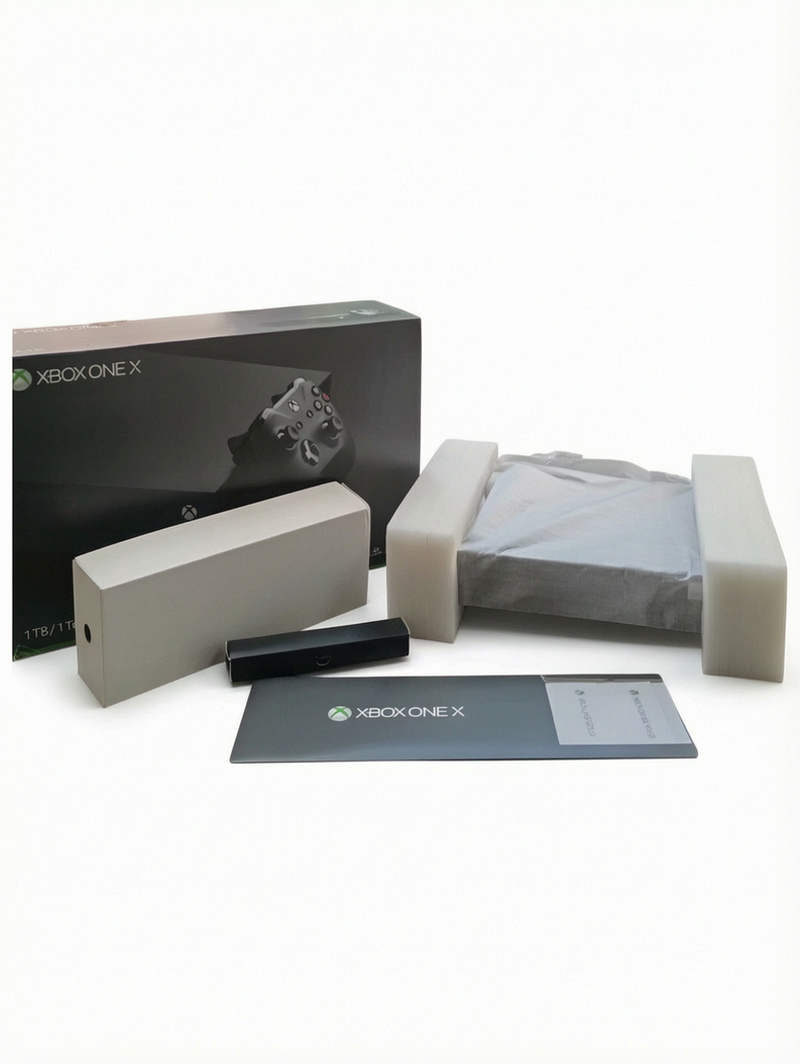 Console Xbox One X en boîte