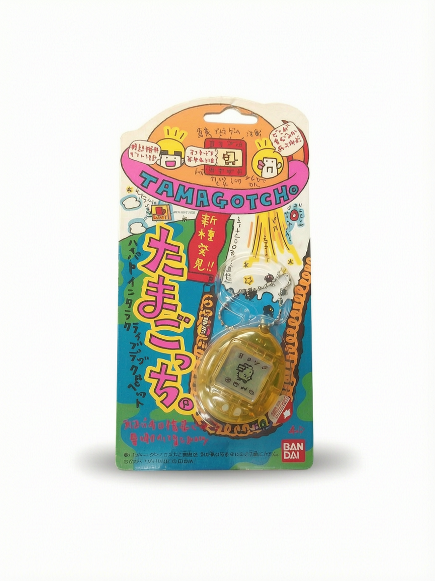 Tamagotchi Bandai version japonaise jaune en blister