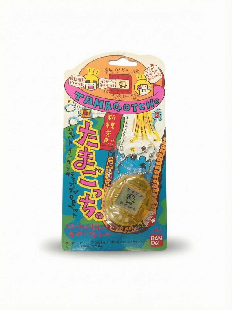 Tamagotchi Bandai version japonaise jaune en blister